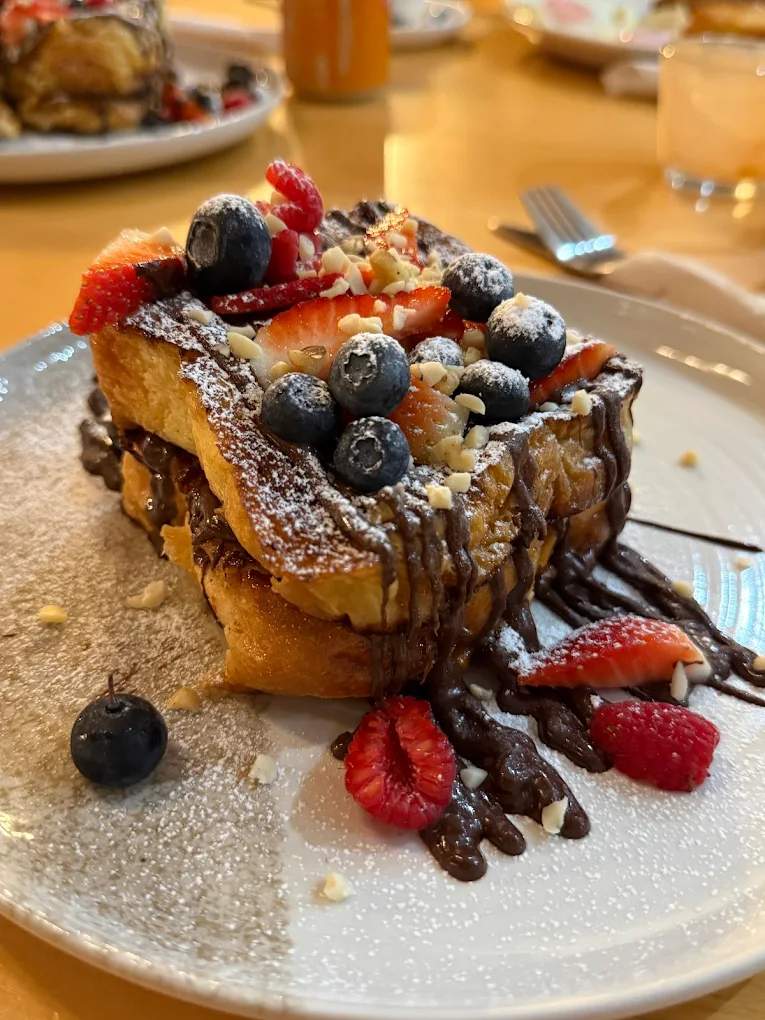 French toast with Nutella, fresh berries and powdered sugar at Peony Café